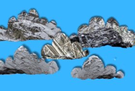 A group of five cloud shapes float across a blue background. The clouds are collages made out of close up photographs of shiny silver silicon surfaces.