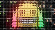 A photographic rendering of a smiling face emoji seen through a refractive glass grid, overlaid with a diagram of a neural network.